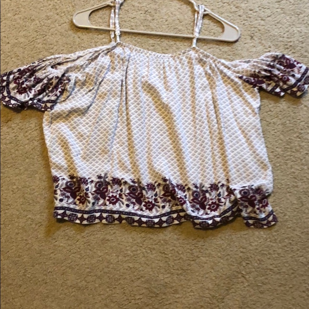 A white and purple off the should top